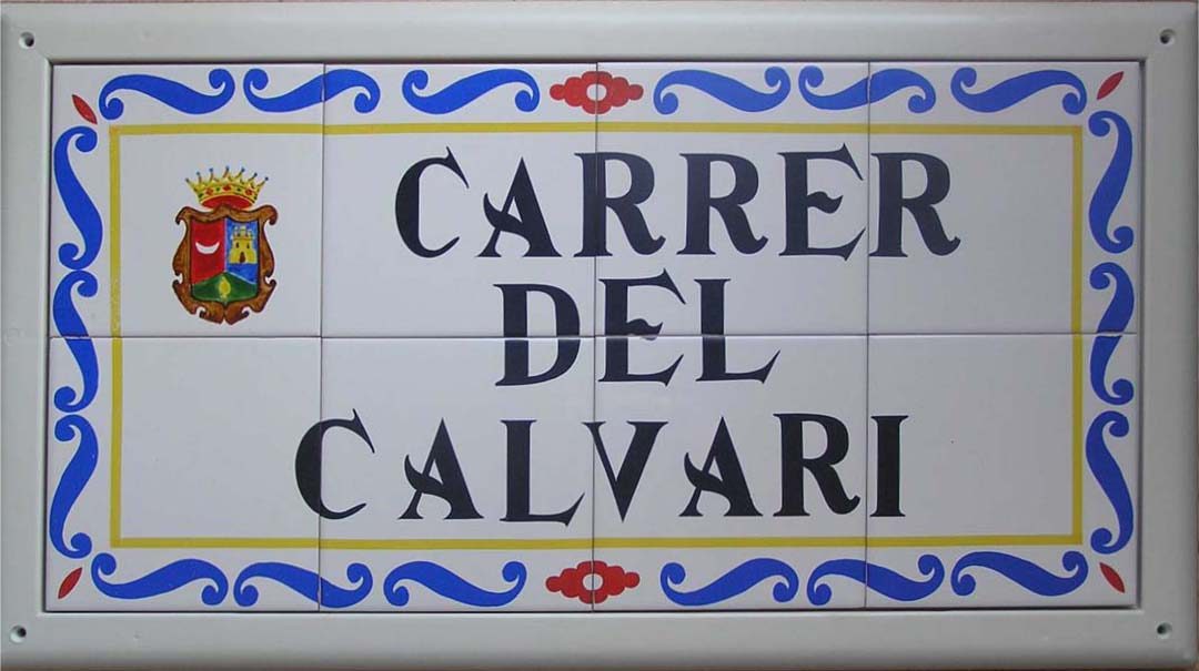 Rótulo de calle grande en cerámica con orla